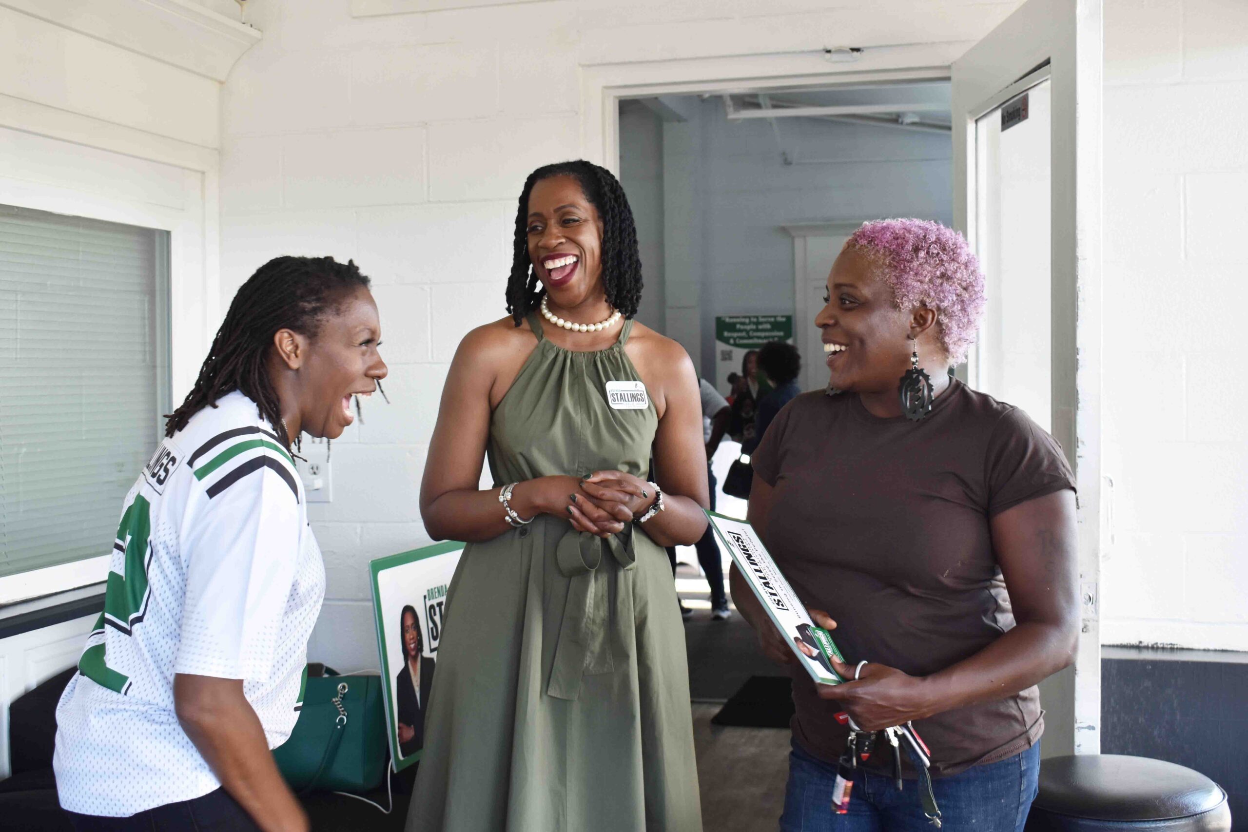 Brenda Stallings shares a laugh with sister, Victoria Stallings (left), and Elnora Wesley (right)