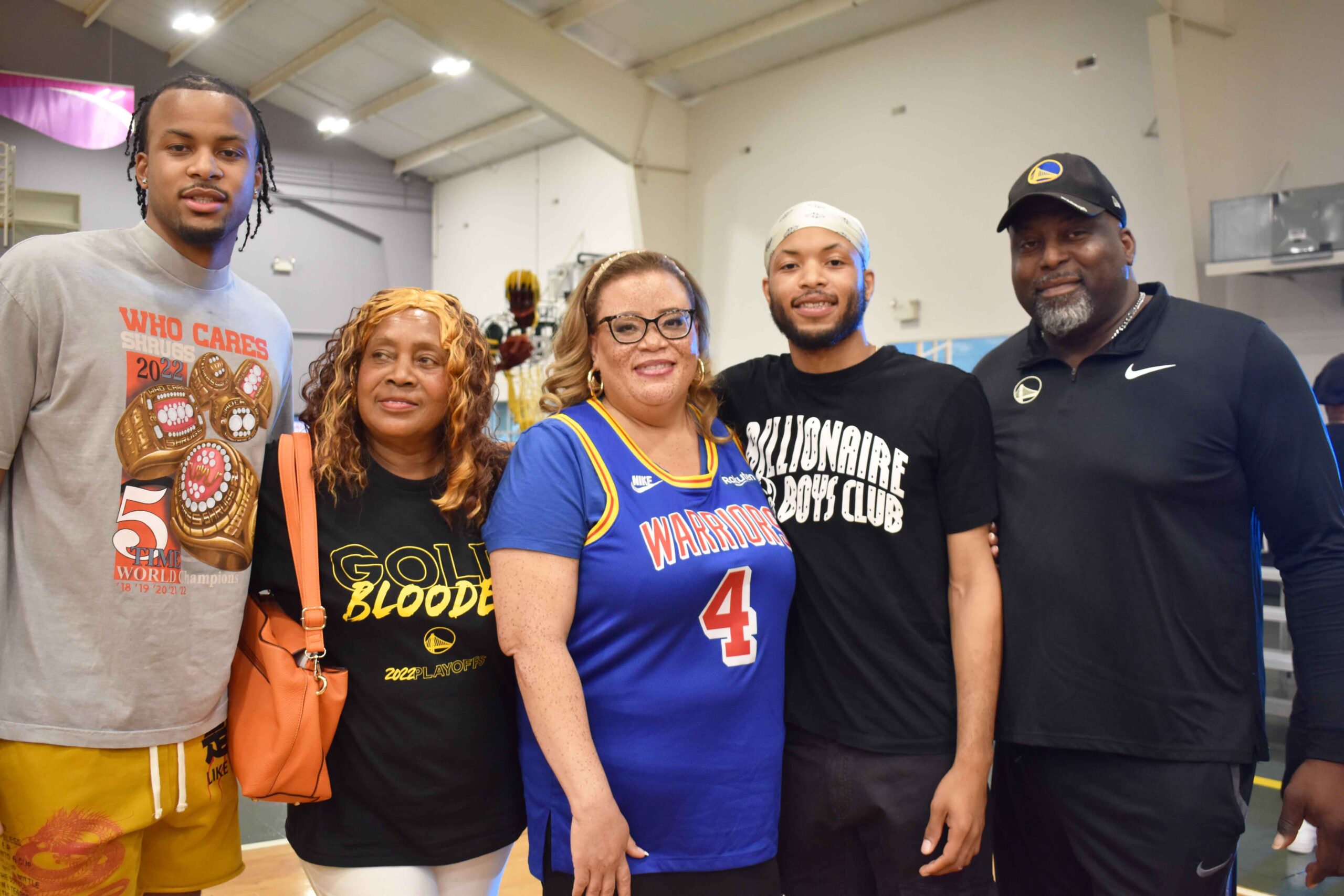 Moses Moody poses with this grandmother, Ruby, mother, Rona, brother, Miles, and father Kareem Moody
