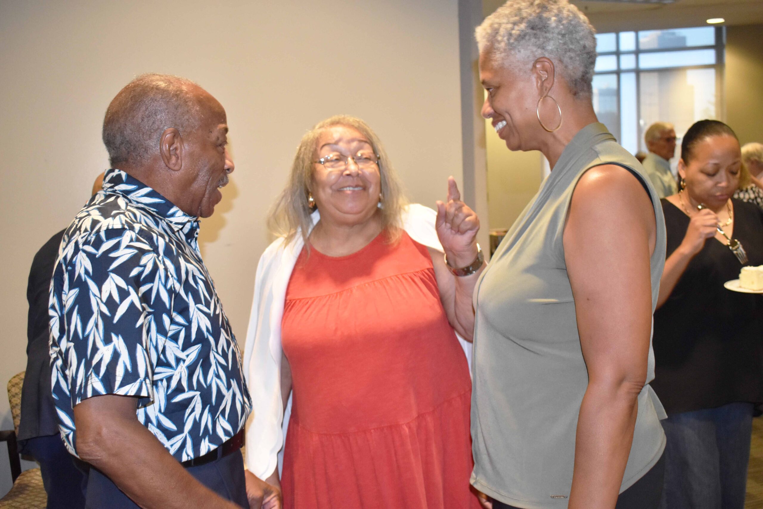 Carl, Sr. and Jacqueline Hampton share a story with Garbo Hearne