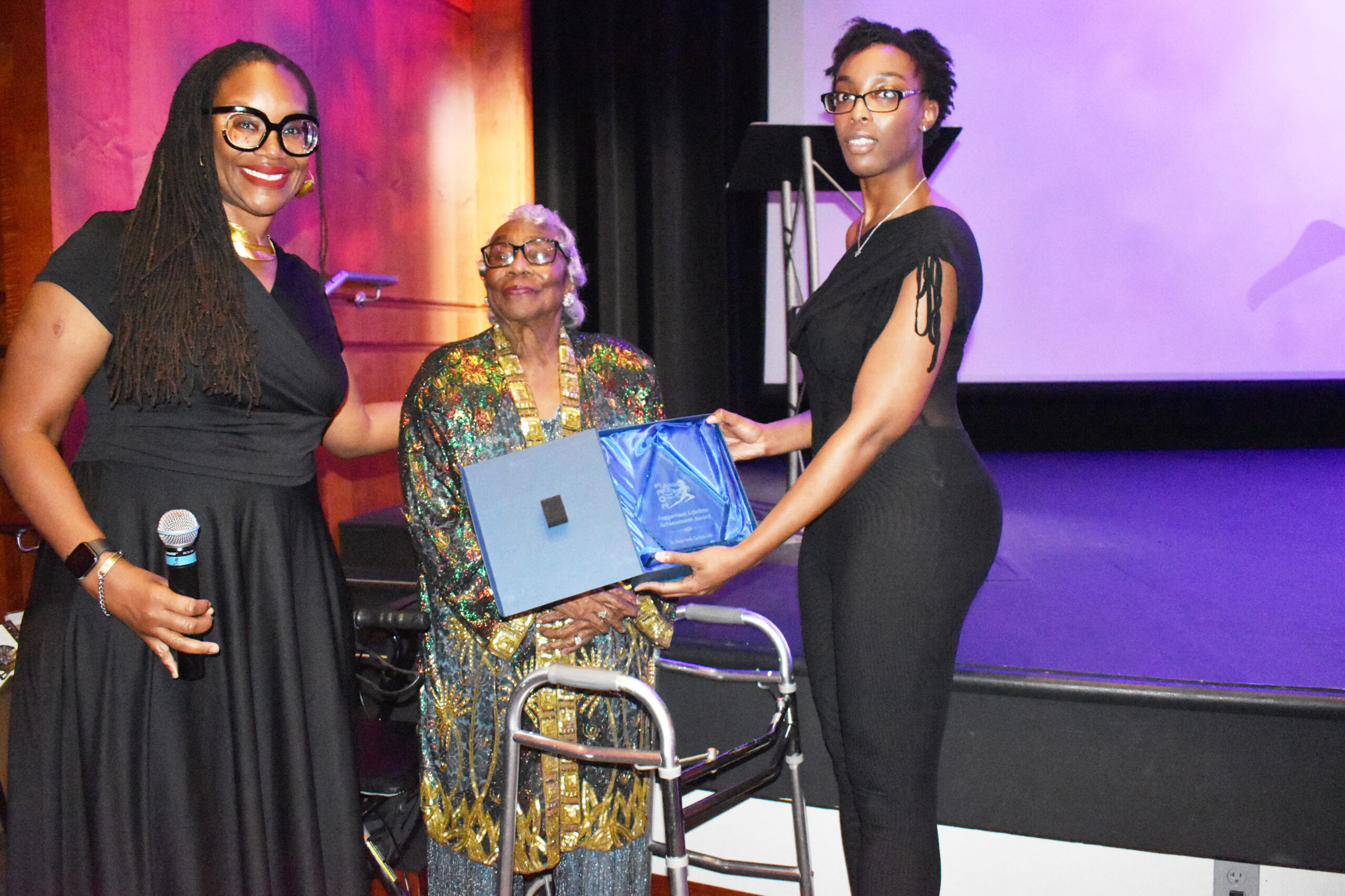 Annie Ruth Zachary Pike (center) receives the Vanguard award