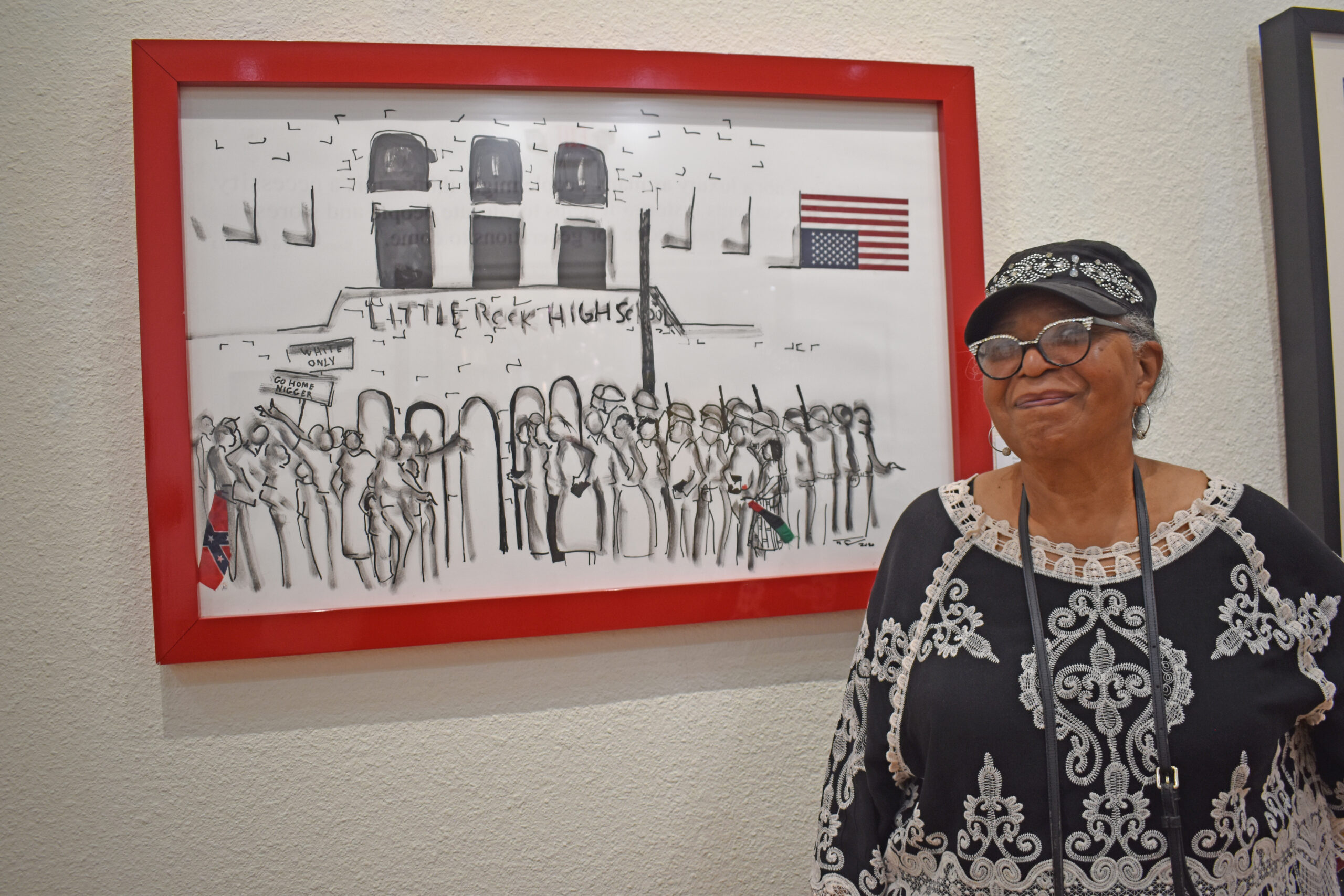 Phyllis Brown, with Frank Frazier art work dedicated to the Little Rock Nine