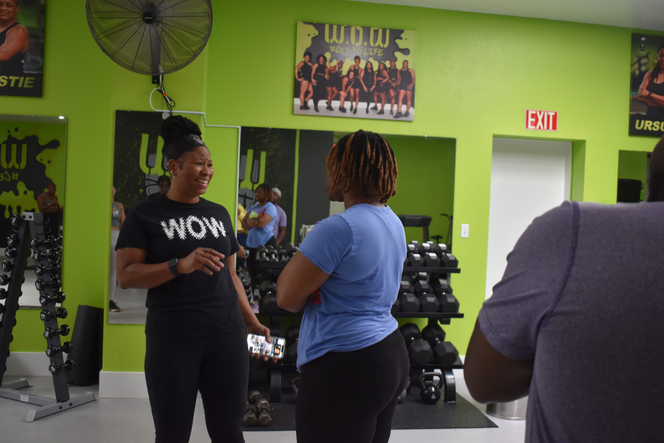 W.O.W. Fitness Trainer, Chanda McCuein-Olive chats with attendee